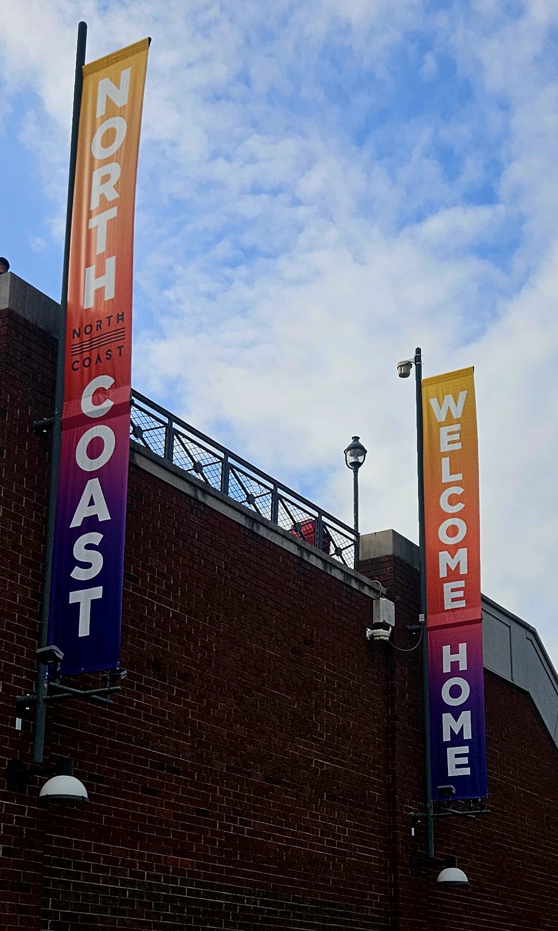 Colorful banners hung outside SeatGeek Stadium read North Coast Welcome Home
