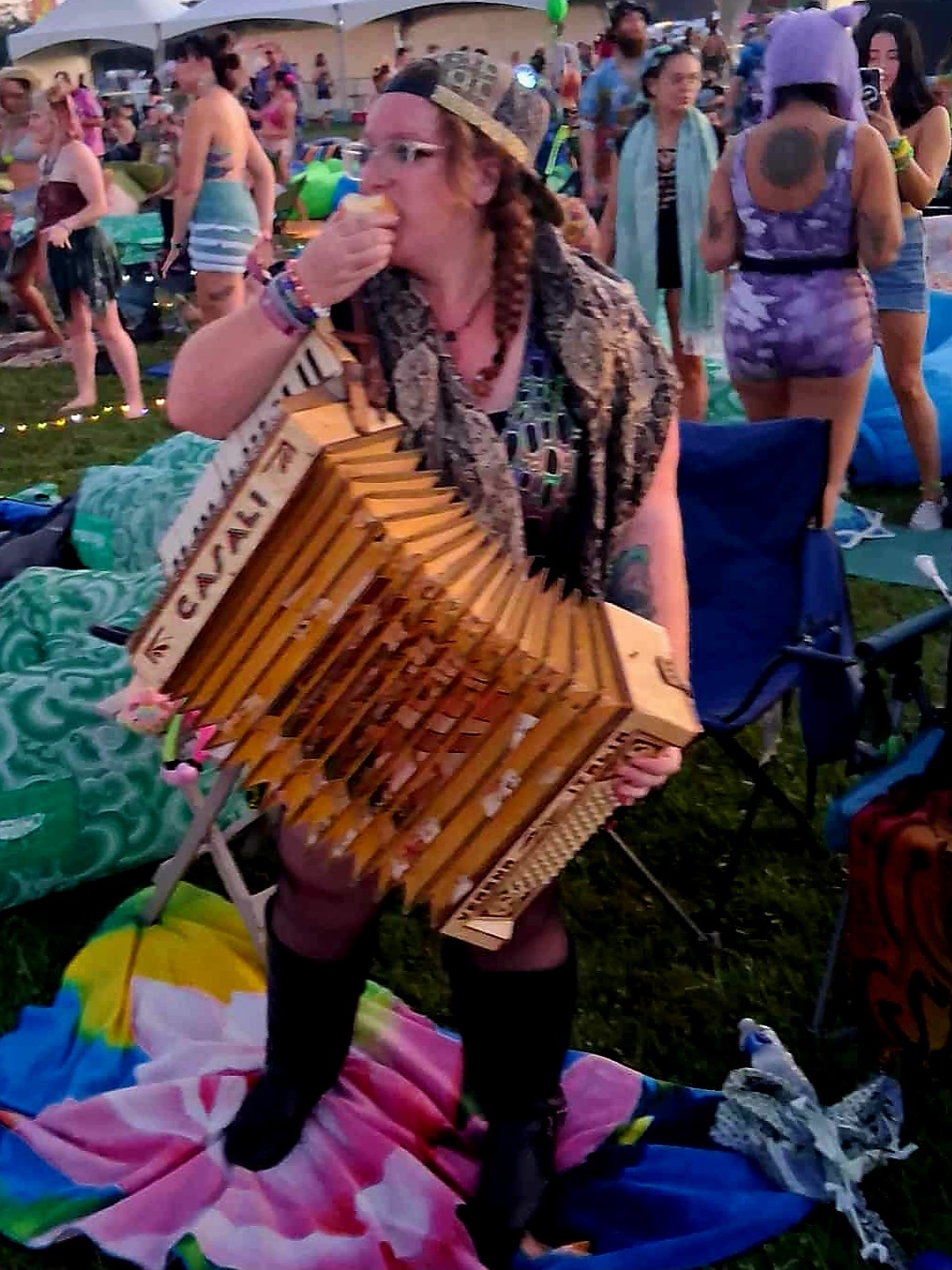 Me, enjoying an apple and dancing around with my accordion I made for Frick Frack Black Jack